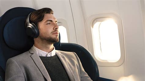 how to listen to music on an airplane with the best headphones for long flights